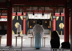 Shinto priest in Jinja                                       